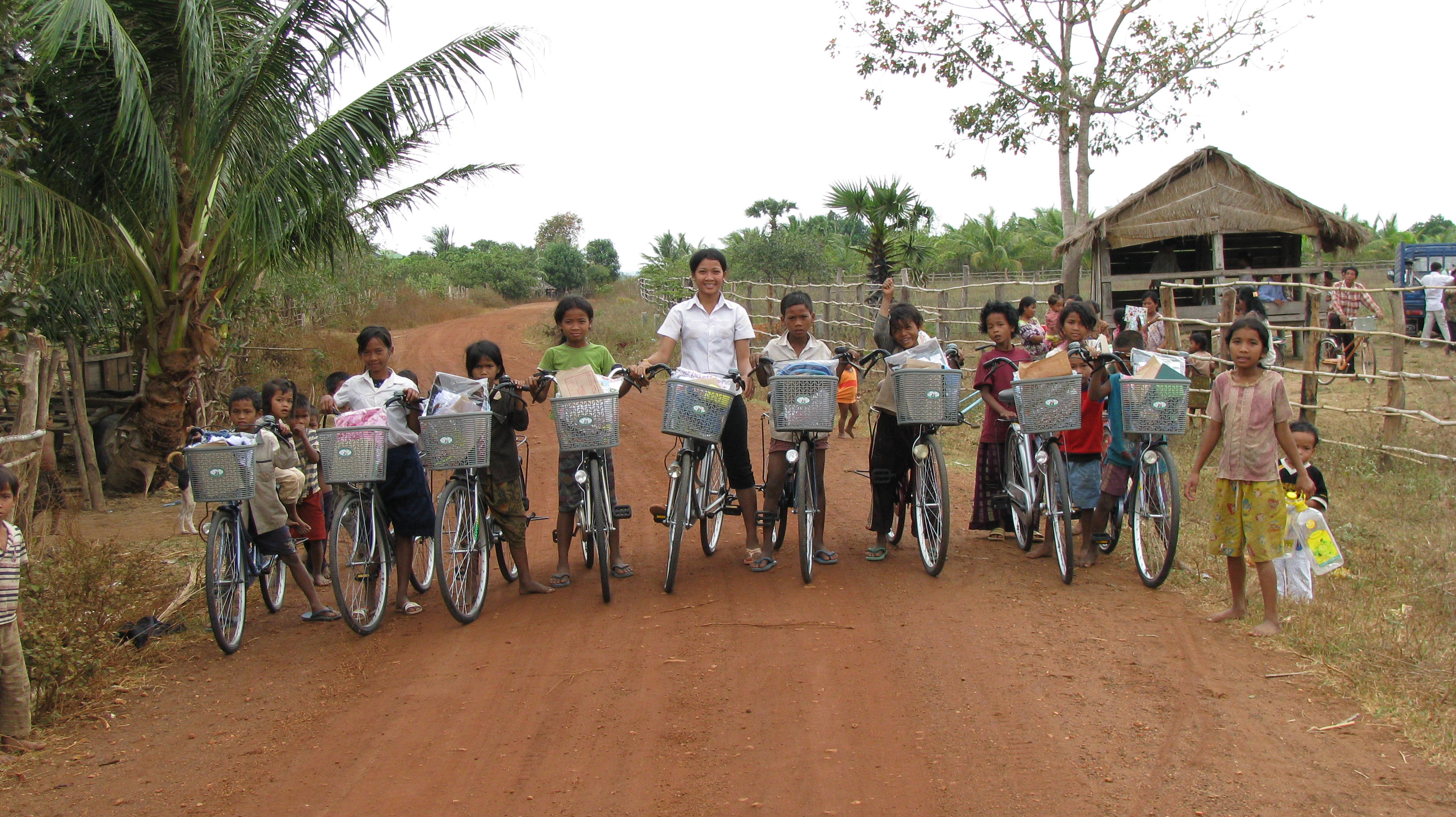 Since split sessions are the rule in Cambodia, most of these children will share a bike with their siblings who have a different session.